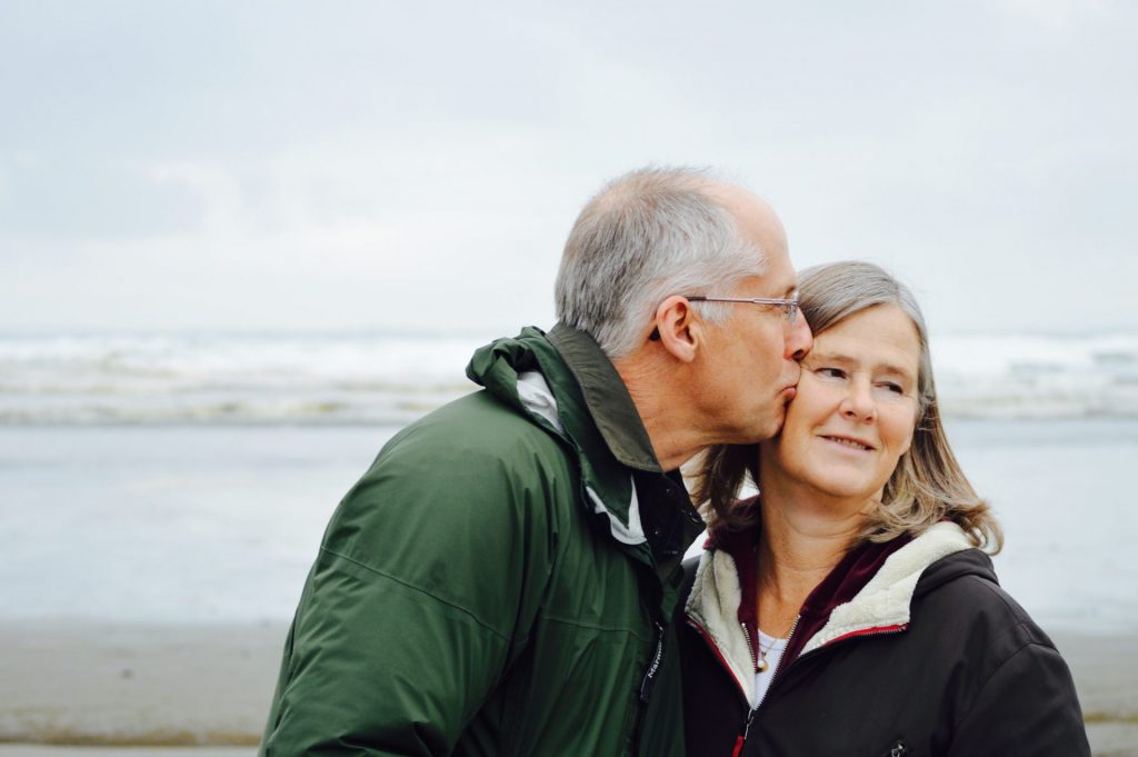 Elderly couple on the beach.